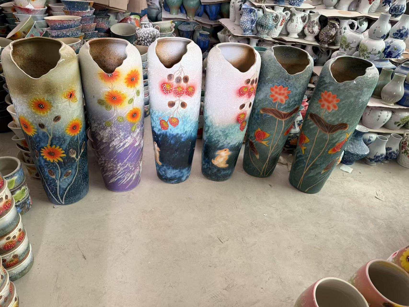 Large blue and white patterned glazed ceramic planter for indoor floor decoration.jpg