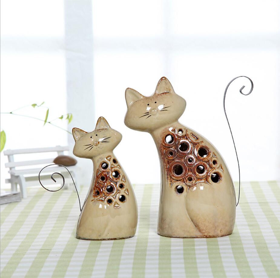 9 (1) white cat hollow body ceramic decoration home.jpg